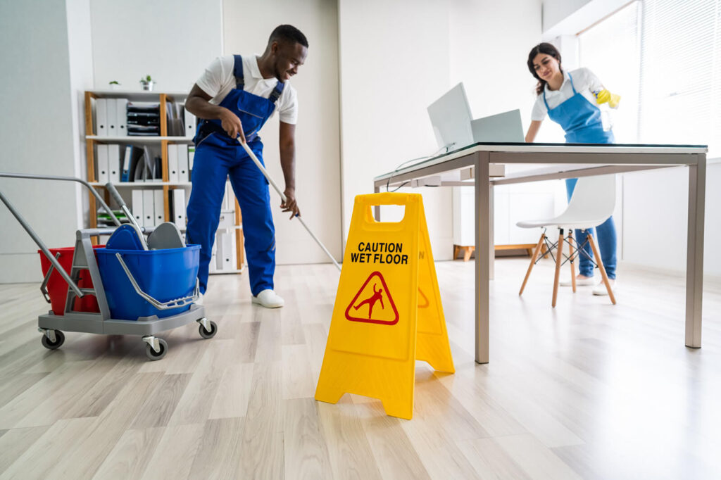Happy Clean's professional cleaners cleaning office.