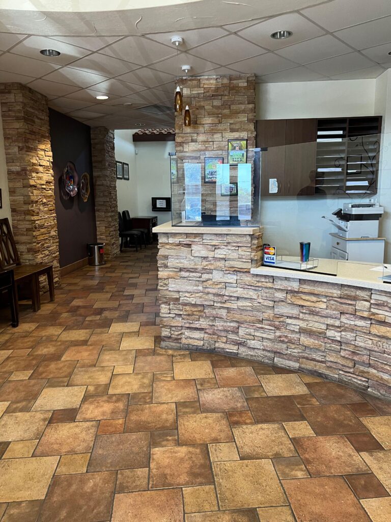 Office cleaning provided by HappyClean for a front desk area